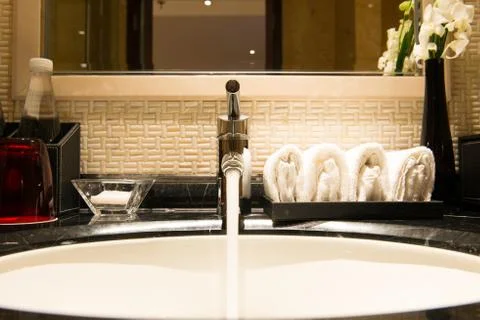 Water tap running Stock Photos