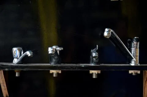 Water taps Stock Photos