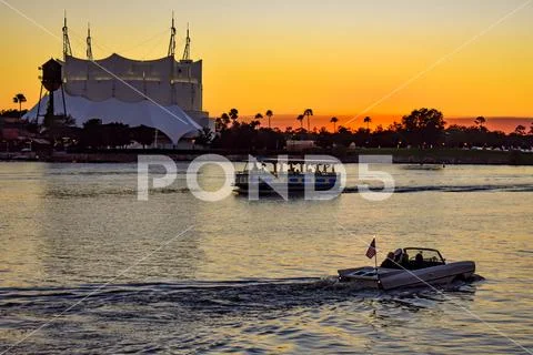 Water taxi amphibious car on silhoutte of Cirque du Soleil background Stock Photos