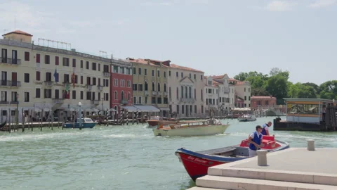 Water Taxis and Canalfront Hotels Near Ferrovia in Venice Stock Footage 341679341