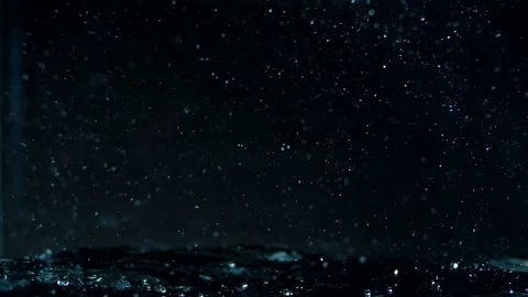 Water texture with bubbles and waves on black background in slow motion Stock Footage 152341882