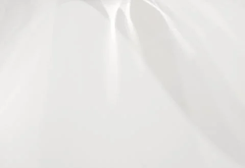 Water texture drop shadow and rays of light on a white wall. Stock Photos