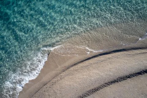 Water texture on sandy beach. Foto stock