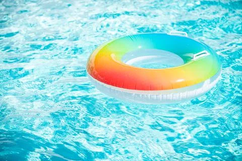 Water textured background. Pool ring in blue refreshing blue pool. 스톡 사진