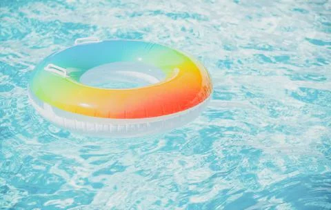 Water textured background. Pool ring in blue refreshing blue pool. 스톡 사진