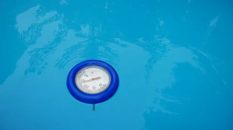 Water thermometer floating in a pool Stock Footage 68188950