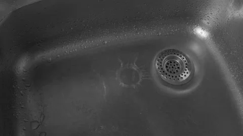 Water , with a thin trickle, flow up in the opposite direction of time Stock Footage 150868180