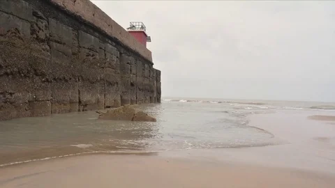 Water timelapse at lighthouse beach in 4k Stock Footage 70153572