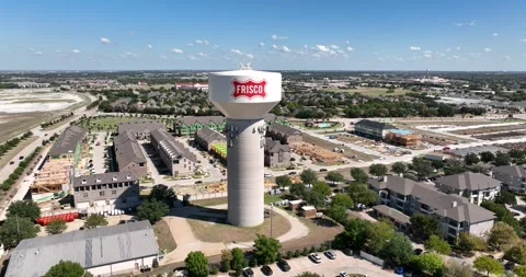 Water Tower and an Apartment Complex Under Construction Aerial View Frisco Texas 스톡 동영상 335733495