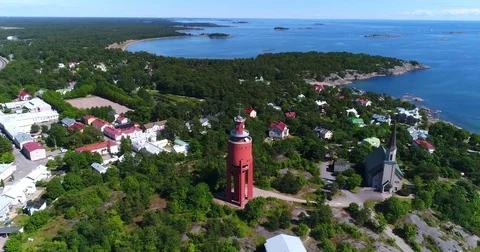 Water tower, Cinema 4k aerial view around the red watertower, revealing Hanko Stock Footage