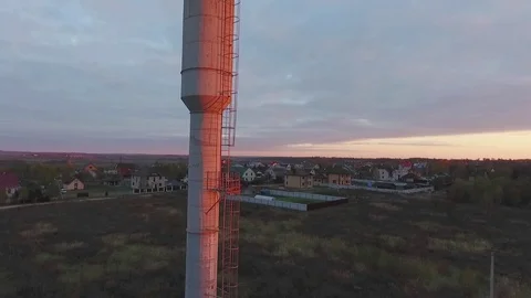 Water Tower in the Countryside During the Sunset  Copter Shooting Stock Footage 69859833