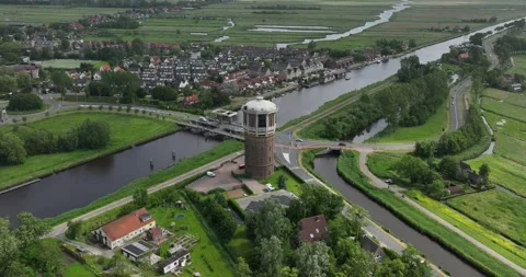 The Water Tower monumental building between Westzaan and Assendelft, aerial 스톡 동영상 276976838