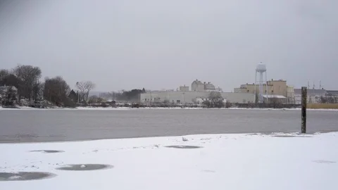 Water tower overlooking a pond Stock Footage 102083134