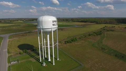 Water Tower for the Town of Spring Valley Kentucky Drone Aerial View Stock Footage 143977534