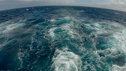 Water trace from ship. Wake of vessel. Back view. Ocean water. Deep blue. Wide Stock Footage 194258325