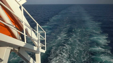 Water trace from ship. Wake of vessel. Back stern view. Lifeboat - free fall in Stock Footage 194514838