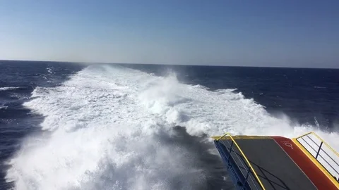 Water trail foaming behind a ferry boat in Aegean, Greece Stock Footage 82413525