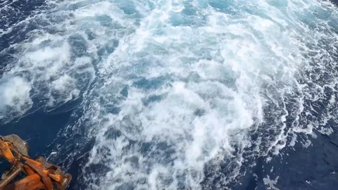 Water trail foaming behind a ferry boat Stock Footage 87469766