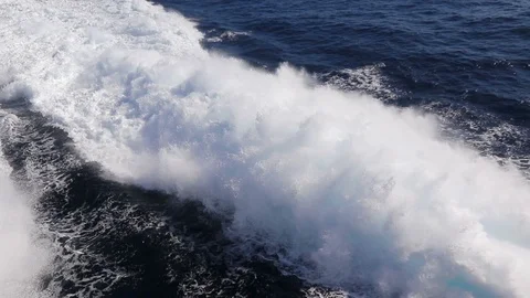Water trail foaming behind a ferry boat in Atlantic ocean Stock Footage 121956860