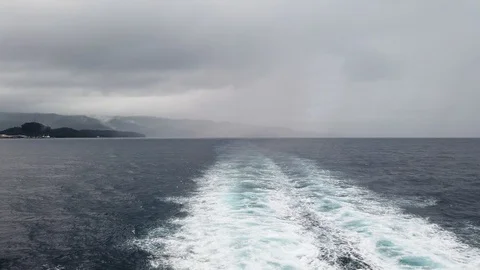 Water trail foaming behind a ferry. Stock Footage 122557465