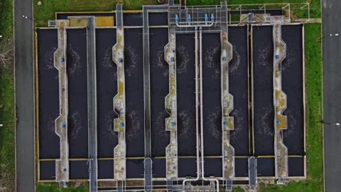 Water treatment facility with multiple tanks and pipes Stock-Footage 332209522