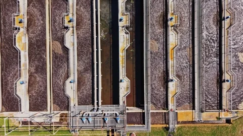 Water treatment facility shows process of cleaning water in tanks Video stock 338405811