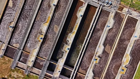 Water treatment facility shows the process of cleaning water near city Video stock 338405843