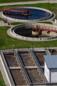 Water treatment facility utilizing circular tanks for purification and filt.. Stock Photos