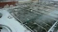 Water treatment plant aerial view with snow HD Footage