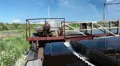Water treatment unit outdoor in summer time, industrial plant HD Footage