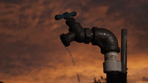 Water trickles out of a spigot due to the drought in the American southwest Stock Footage 197731753