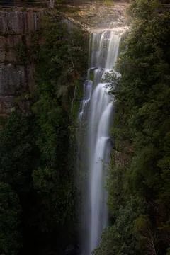 Water tumbles over a cliff ledge in Southern Highlands Fotos Stock