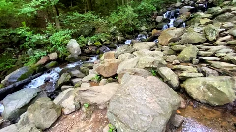 Water Tumbles Through The A Perfect Stack of Piled Rocks At Amicalola Falls P Stock Footage 138948919