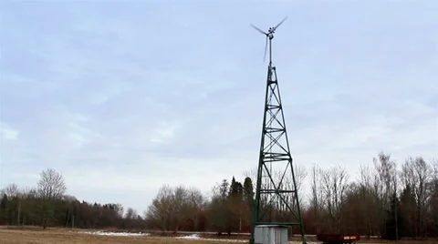 Water turbine on a metal tower Stock Footage