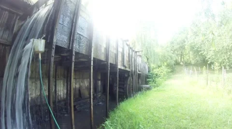 Water Turbines old Czech forge, over the edge of the water flowing Stock Footage 46417701