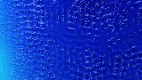 Water under the action of vibration creates graphical textures. Blue background Stock Footage