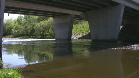 Water under the bridge pan Stock Footage 661682