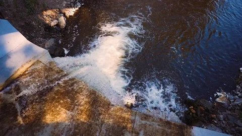 Water under pressure flows through the dam, close-up. Stock Footage 111570250
