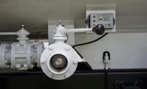 Water valves at the rear of a fire engine Stock Photos