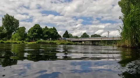 Water view dutch train riding by Video stock 201437472