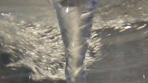 Water vortex in glass container Stock Footage 95234230