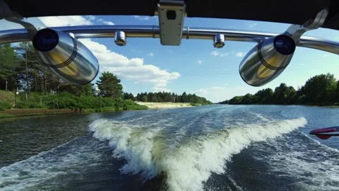 Water wake behind a speed boat with wakeboard tower speakers Stock-Footage 338343972