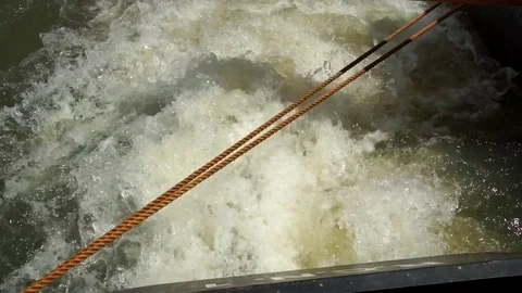 Water wake of the engine of a small boat About water, boat Stock Footage 71178688