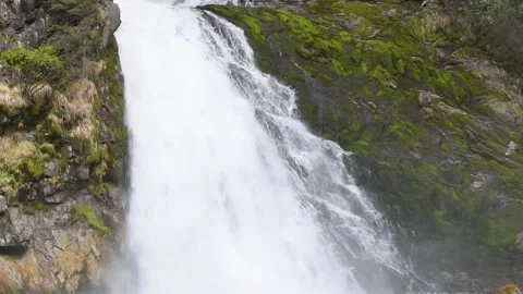 Water from a waterfall in the Dolomites Video stock 240111819