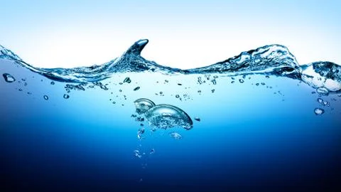 Water wave with bubbles in the deep Stock Photos