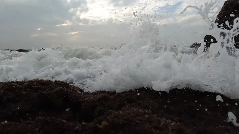 Water wave splash  on a beach and bubbles Stock Footage 146947726