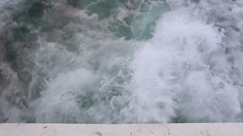 Water waves behind the boat Stock Footage 55860059
