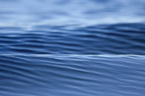 Water waves blue background Stock Photos