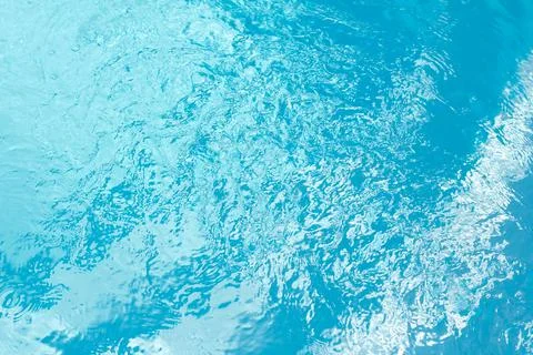 Water waves in a blue pool Stock Photos