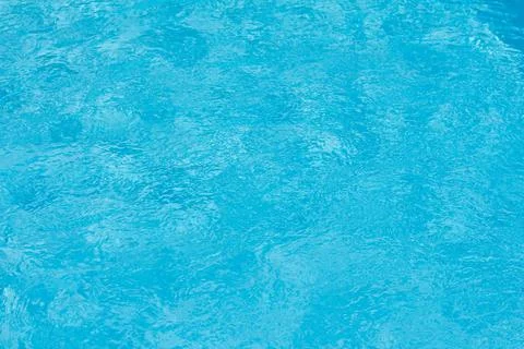 Water waves in a blue pool Stock Photos